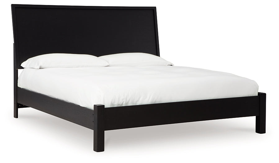 Danziar King Panel Bed with Mirrored Dresser and Nightstand