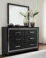 Kaydell Queen Upholstered Panel Headboard with Mirrored Dresser