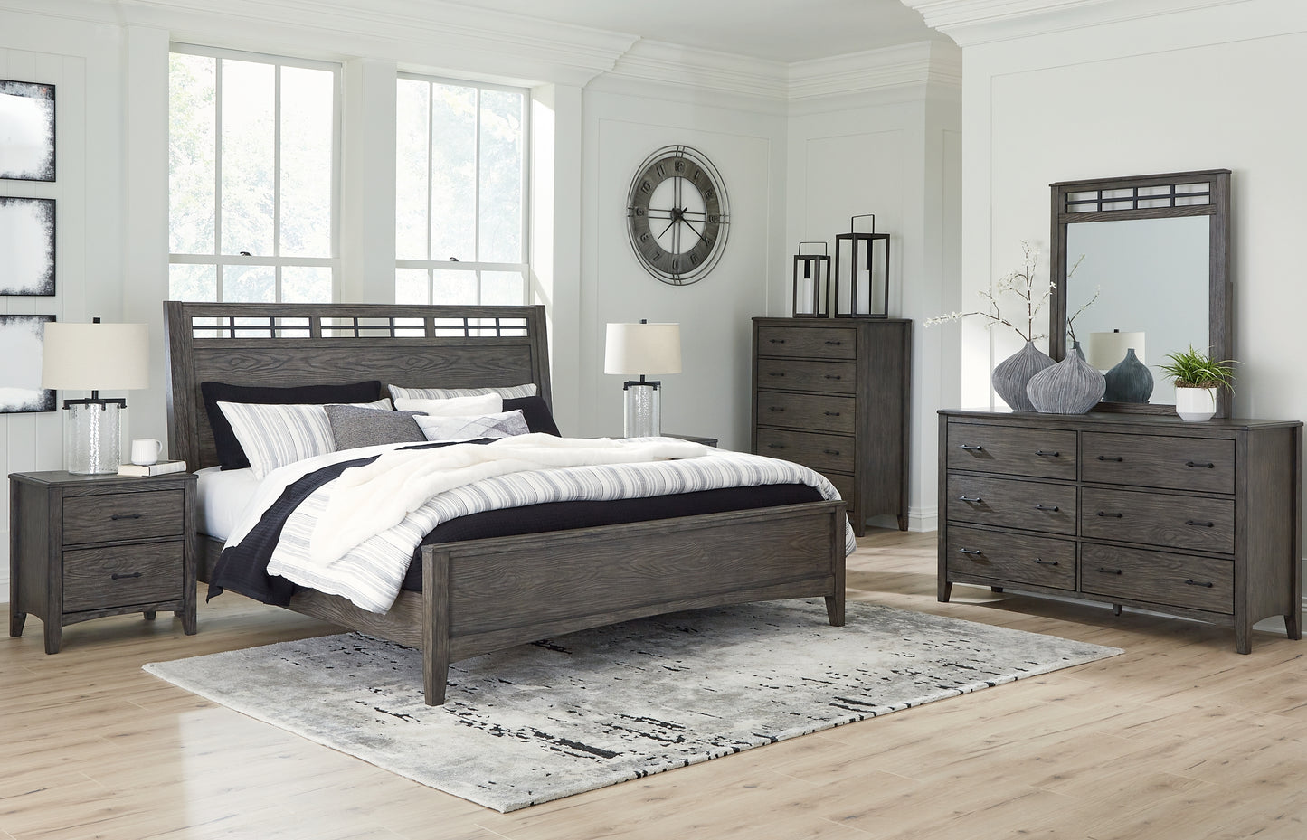 Montillan King Panel Bed with Mirrored Dresser, Chest and 2 Nightstands